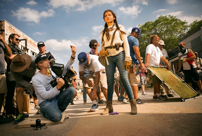 Left to right: Director/Executive Producer Michael Bay and Isabela Moner on the set of TRANSFORMERS: THE LAST KNIGHT, from Paramount Pictures.