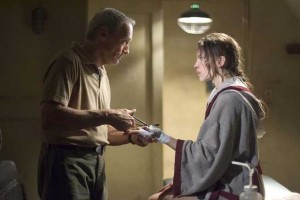 CLINT EASTWOOD as Frankie and HILARY SWANK as Maggie in Warner Bros. Pictures drama Million Dollar Baby.  The Malpaso production also stars Morgan Freeman.   PHOTOGRAPHS TO BE USED SOLELY FOR ADVERTISING, PROMOTION, PUBLICITY OR REVIEWS OF THIS SPECIFIC MOTION PICTURE AND TO REMAIN THE PROPERTY OF THE STUDIO. NOT FOR SALE OR REDISTRIBUTION.